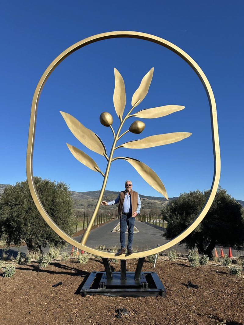 Marc Taub with Saracina's Entryway Sculpture